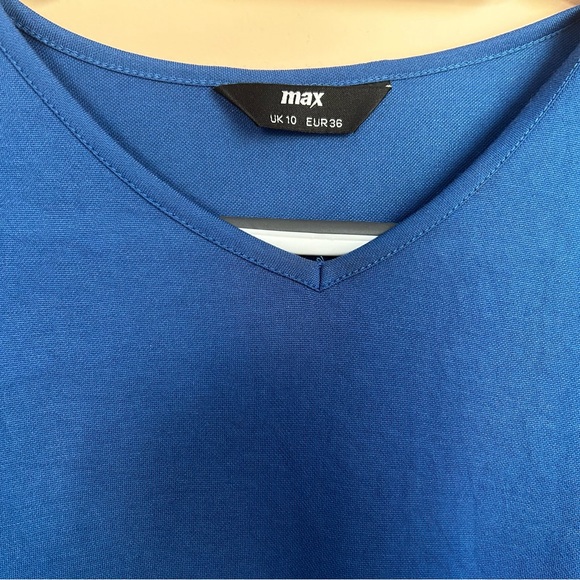 Beautiful never worn blue blouse with side detail. - Picture 3 of 3